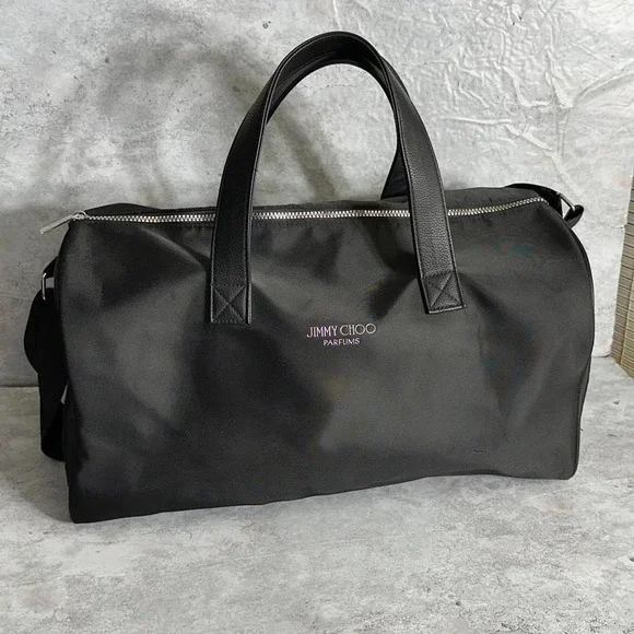 Jimmy Choo Weekend Bag, 18"L X 10"H X 10"D Adjustable Black crossbody Dufflebag - Picture 1 of 5